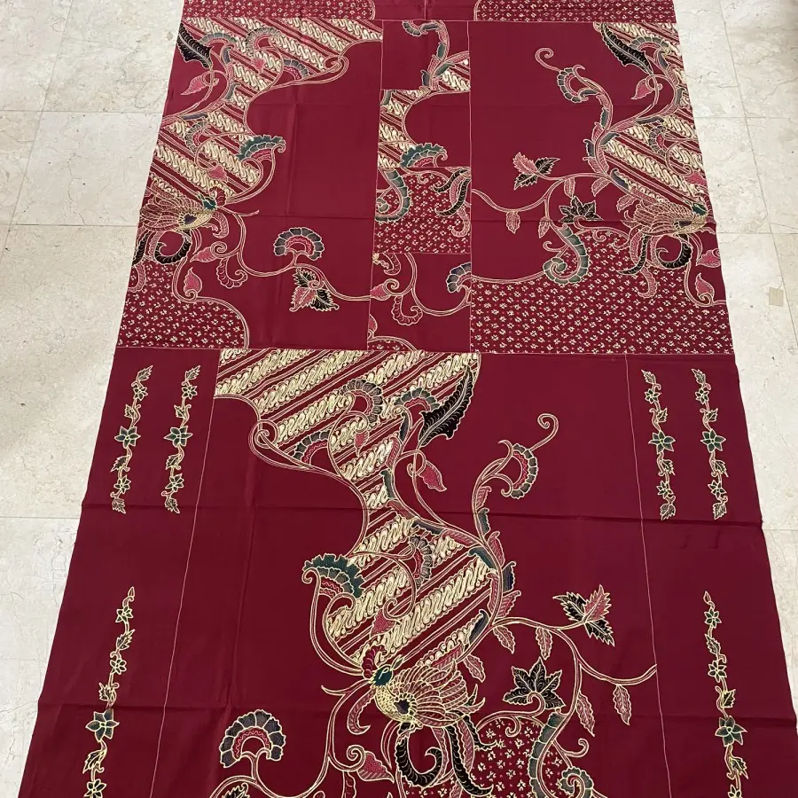 batik tulis pola kemeja merah emas 1.webp