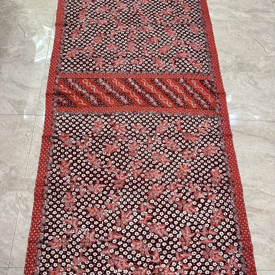 BATIK TULIS LASEM MOTIF TRUNTUM TUMPAL TENGAH ORANGE PUTIH 1.webp